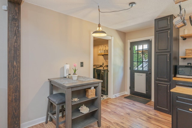 313 Lakeview Dr, Crestview, FL 32536 - entrance foyer featuring independent washer and dryer and light wood-style floors
