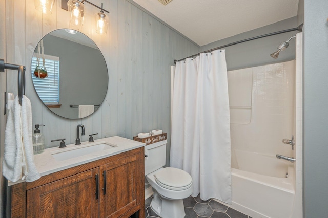 313 Lakeview Dr, Crestview, FL 32536 - bathroom with vanity, shower / bath combo with shower curtain, tile patterned flooring, and wooden walls