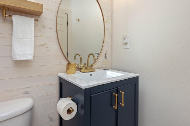 313 Lakeview Dr, Crestview, FL 32536 - half bathroom with vanity and wood walls