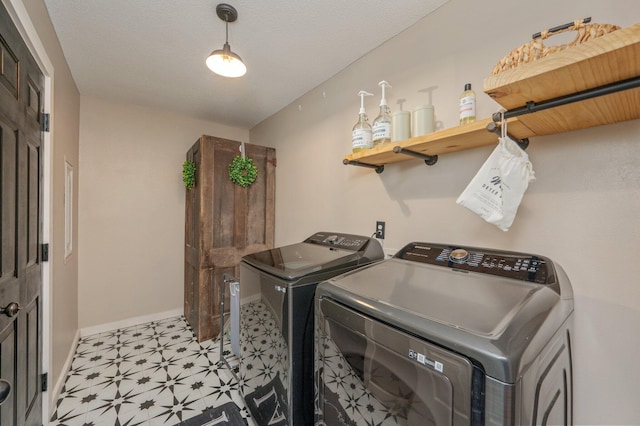 313 Lakeview Dr, Crestview, FL 32536 - laundry area featuring washer and dryer and light flooring