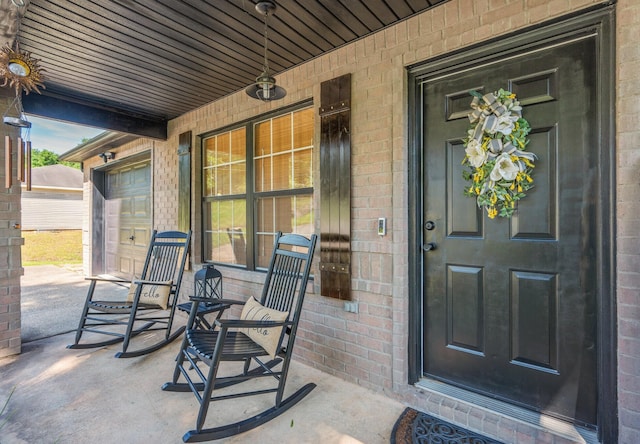 313 Lakeview Dr, Crestview, FL 32536 - property entrance featuring covered porch and brick siding