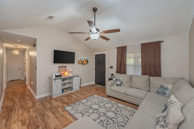 313 Lakeview Dr, Crestview, FL 32536 - living room featuring ceiling fan, light wood-style flooring, and vaulted ceiling