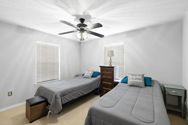 131 Wedgewood Ln, Crestview, FL 32536 - bedroom with carpet floors, ceiling fan, and a textured ceiling