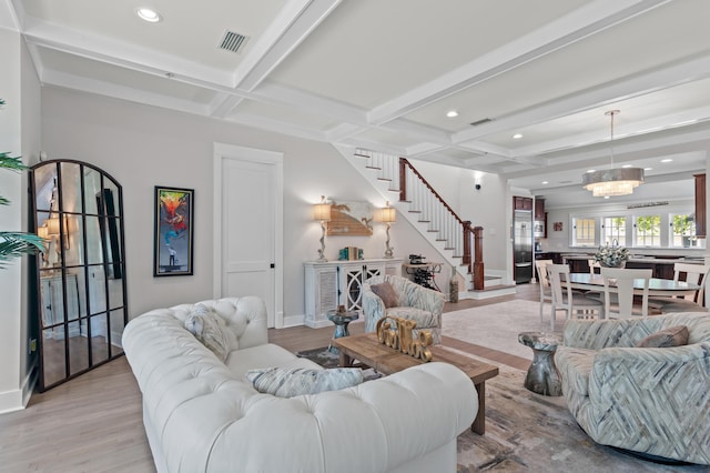 1510 Match Point Ln Unit 303, Panama City Beach, FL 32413 - living room with coffered ceiling, stairs, light wood finished floors, beam ceiling, and recessed lighting