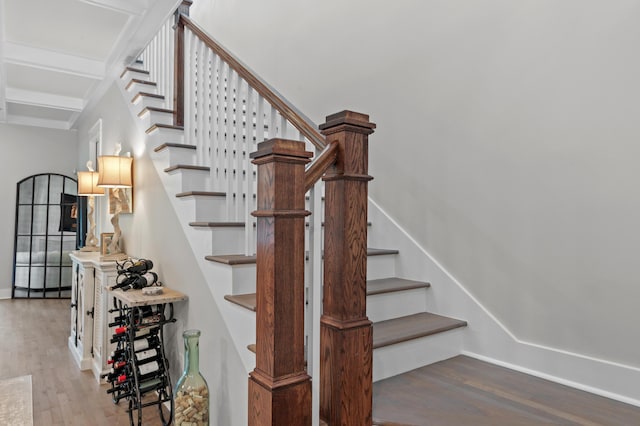 1510 Match Point Ln Unit 303, Panama City Beach, FL 32413 - staircase with wood finished floors and baseboards