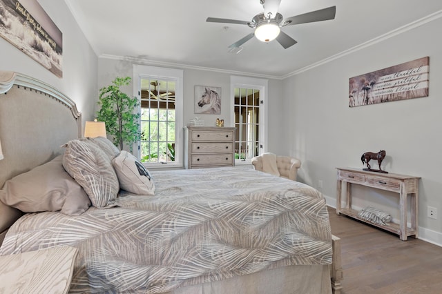 1510 Match Point Ln Unit 303, Panama City Beach, FL 32413 - bedroom featuring wood finished floors, crown molding, and a ceiling fan