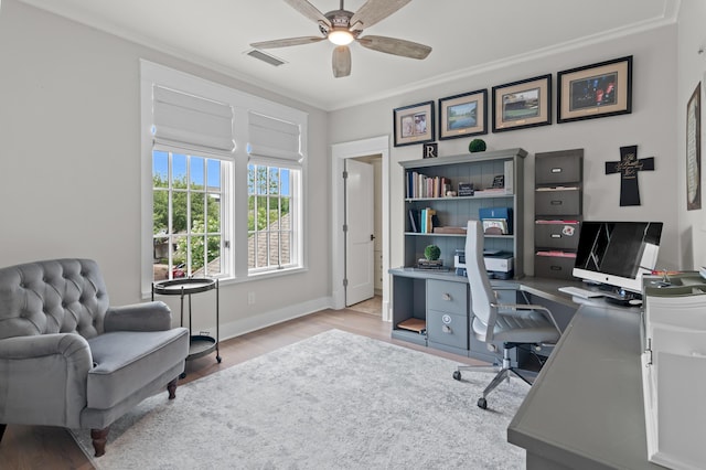 1510 Match Point Ln Unit 303, Panama City Beach, FL 32413 - office with ornamental molding, a ceiling fan, and wood finished floors