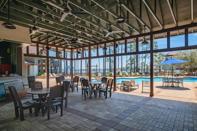 1510 Match Point Ln Unit 303, Panama City Beach, FL 32413 - sunroom featuring plenty of natural light