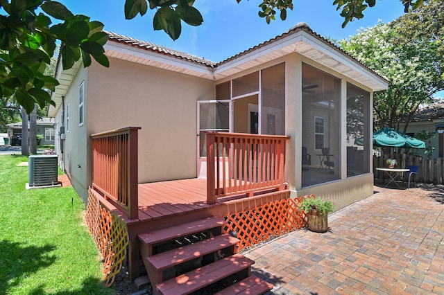 113 Mantero Way, Destin, FL 32541 - wooden terrace with a sunroom and a patio area