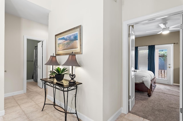 113 Mantero Way, Destin, FL 32541 - corridor featuring light tile patterned floors and baseboards