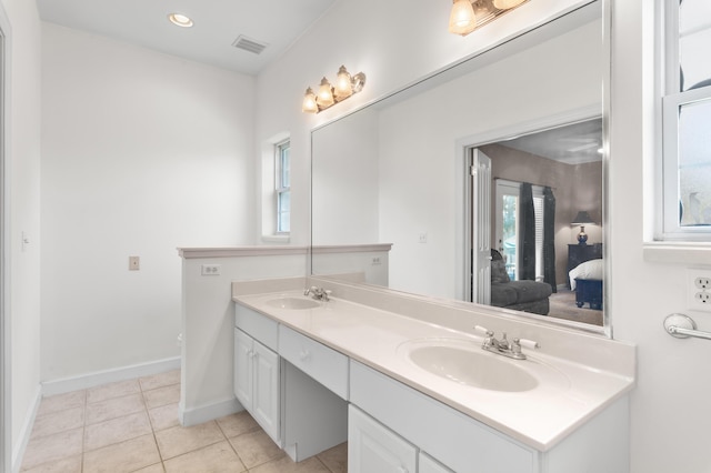 113 Mantero Way, Destin, FL 32541 - ensuite bathroom featuring double vanity, tile patterned floors, and recessed lighting