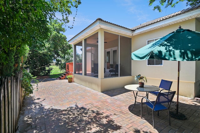 113 Mantero Way, Destin, FL 32541 - view of patio featuring a sunroom and ceiling fan