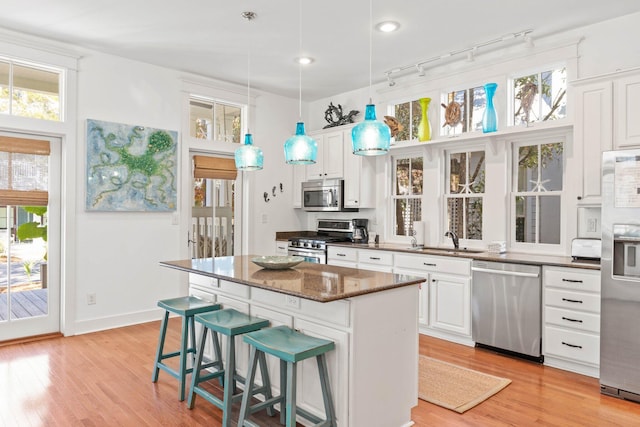 97 Red Cedar Way, Santa Rosa Beach, FL 32459 - kitchen featuring appliances with stainless steel finishes, white cabinetry, plenty of natural light, and recessed lighting