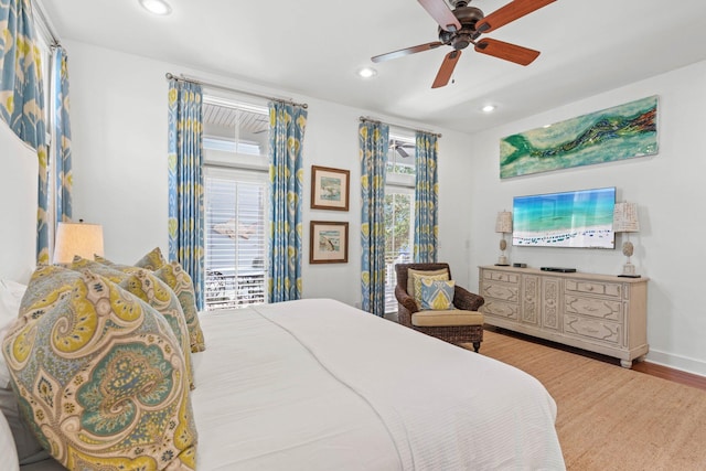 97 Red Cedar Way, Santa Rosa Beach, FL 32459 - bedroom featuring access to outside, multiple windows, recessed lighting, wood finished floors, and ceiling fan