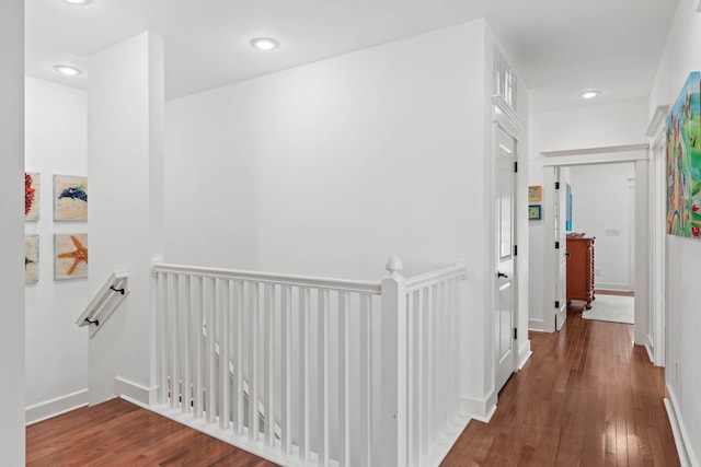 97 Red Cedar Way, Santa Rosa Beach, FL 32459 - hallway with an upstairs landing, wood finished floors, and recessed lighting