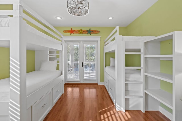 97 Red Cedar Way, Santa Rosa Beach, FL 32459 - bedroom with wood finished floors, access to outside, french doors, and recessed lighting