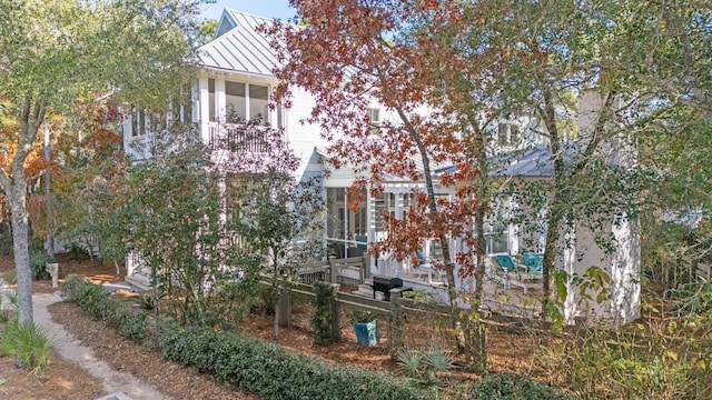 97 Red Cedar Way, Santa Rosa Beach, FL 32459 - view of home's exterior featuring a standing seam roof and a metal roof