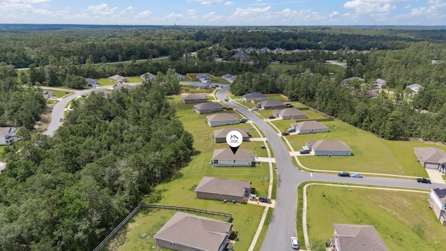 6721 Sarah Ann Way, Laurel Hill, FL 32567 - aerial perspective of suburban area featuring a forest
