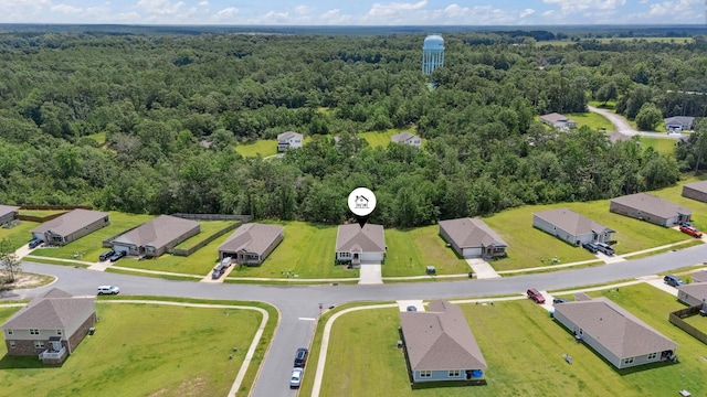 6721 Sarah Ann Way, Laurel Hill, FL 32567 - aerial view of residential area featuring a forest
