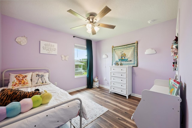 6721 Sarah Ann Way, Laurel Hill, FL 32567 - bedroom featuring wood finished floors and ceiling fan