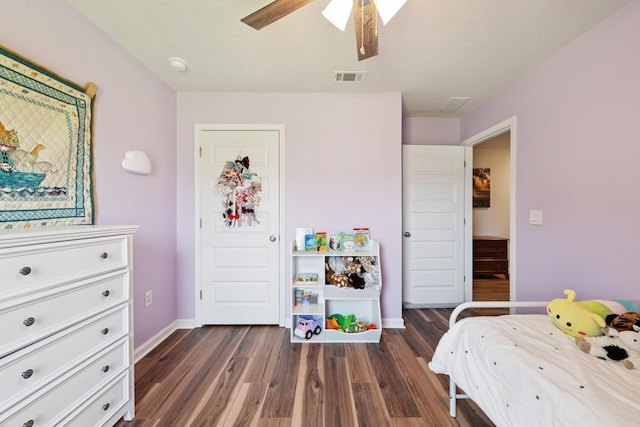 6721 Sarah Ann Way, Laurel Hill, FL 32567 - bedroom with dark wood-type flooring and a ceiling fan