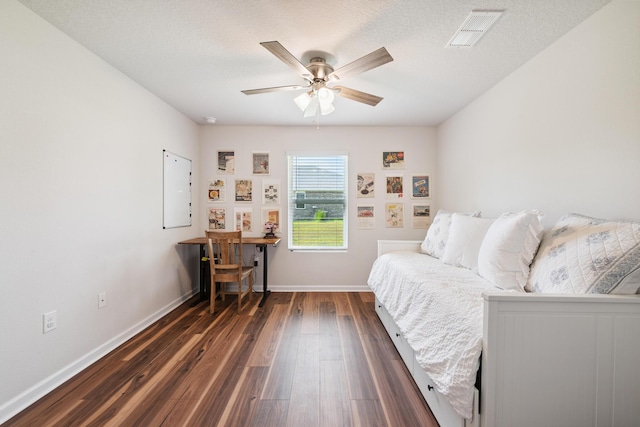 6721 Sarah Ann Way, Laurel Hill, FL 32567 - bedroom featuring dark wood-style flooring and ceiling fan