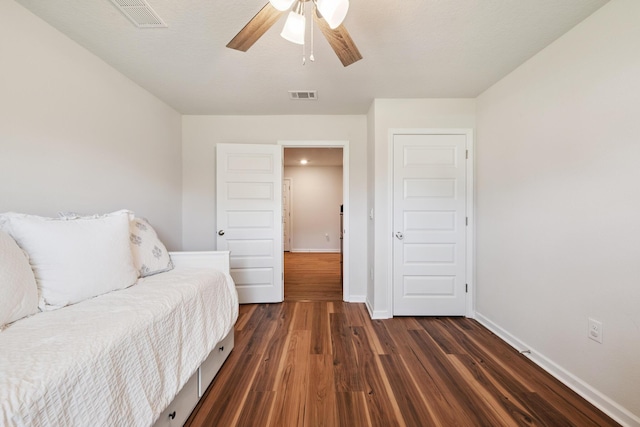 6721 Sarah Ann Way, Laurel Hill, FL 32567 - living area with ceiling fan and dark wood-style flooring