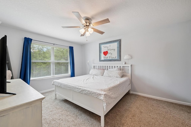 6721 Sarah Ann Way, Laurel Hill, FL 32567 - bedroom featuring light colored carpet, a textured ceiling, and a ceiling fan