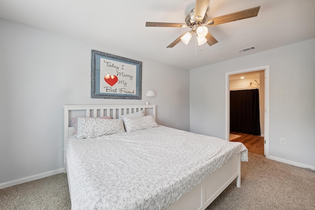 6721 Sarah Ann Way, Laurel Hill, FL 32567 - carpeted bedroom featuring baseboards and ceiling fan