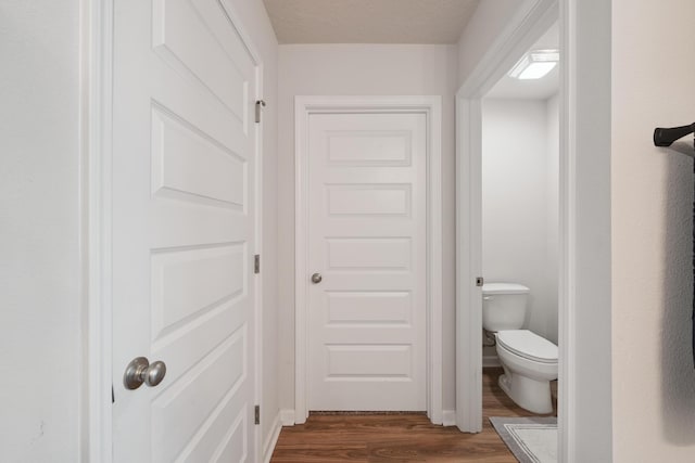 6721 Sarah Ann Way, Laurel Hill, FL 32567 - bathroom with wood finished floors and toilet