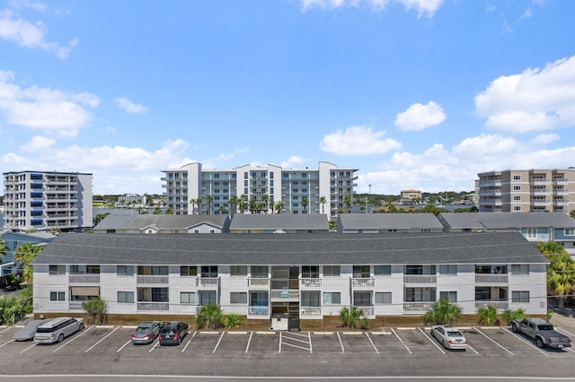 445 Gulf Shore Dr Unit 206, Destin, FL 32541 - view of apartment building / complex featuring uncovered parking