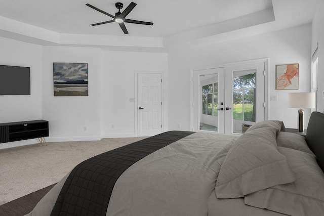 1005 Shalimar Point Dr, Shalimar, FL 32579 - carpeted bedroom with french doors, access to outside, a tray ceiling, and a ceiling fan