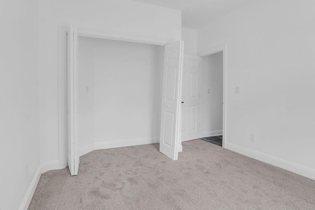 1005 Shalimar Point Dr, Shalimar, FL 32579 - unfurnished bedroom featuring carpet flooring and a closet