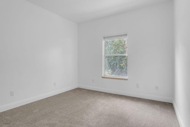 1005 Shalimar Point Dr, Shalimar, FL 32579 - carpeted empty room featuring baseboards