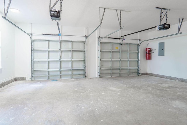 1005 Shalimar Point Dr, Shalimar, FL 32579 - garage with a garage door opener and electric panel