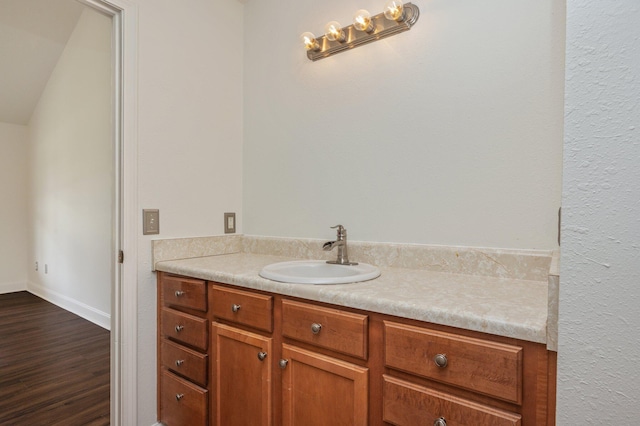 24 W Violet Ln, Defuniak Springs, FL 32433 - bathroom featuring vanity and wood finished floors