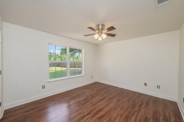 24 W Violet Ln, Defuniak Springs, FL 32433 - unfurnished room featuring dark wood finished floors and ceiling fan