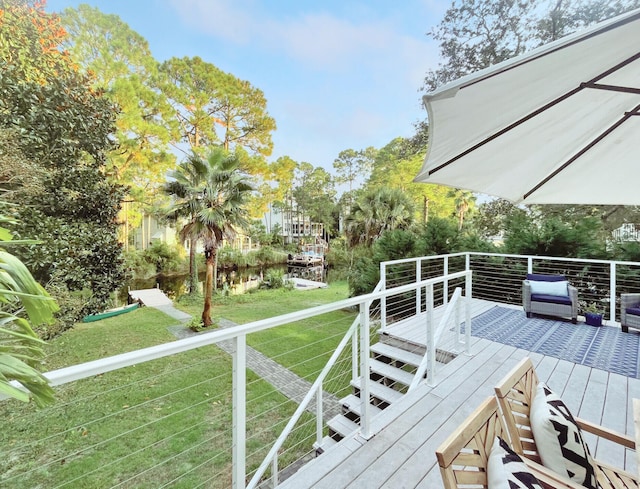 192 Lake Pointe Dr, Santa Rosa Beach, FL 32459 - deck featuring a water view and a yard