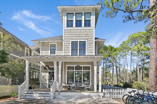 395 Tumblehome Way, Santa Rosa Beach, FL 32459 - view of front of property featuring covered porch, an outdoor living space, and a shingled roof