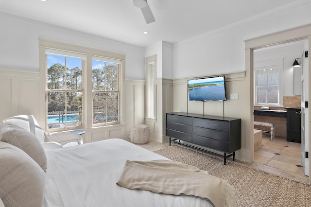 395 Tumblehome Way, Santa Rosa Beach, FL 32459 - bedroom featuring a decorative wall, ornamental molding, wainscoting, a ceiling fan, and recessed lighting