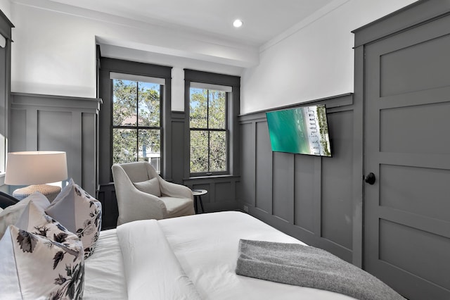 395 Tumblehome Way, Santa Rosa Beach, FL 32459 - bedroom with a decorative wall, recessed lighting, a wainscoted wall, and crown molding