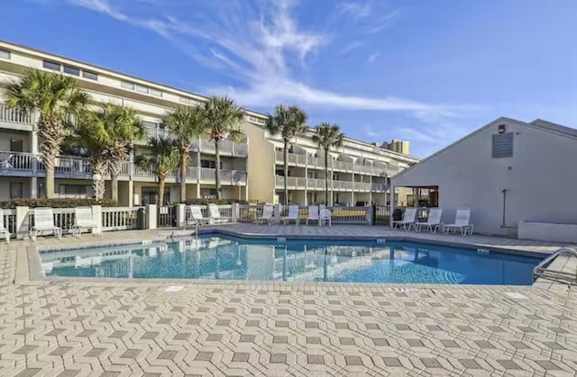 17614 Front Beach Rd Unit 12E, Panama City Beach, FL 32413 - community pool featuring a patio area