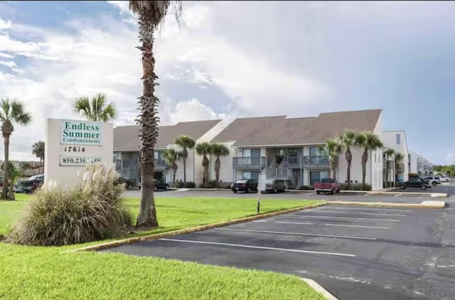 17614 Front Beach Rd Unit 12E, Panama City Beach, FL 32413 - view of property with uncovered parking