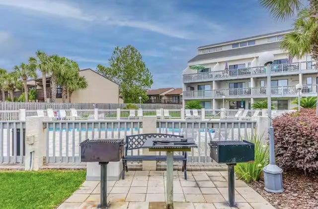 17614 Front Beach Rd Unit 12E, Panama City Beach, FL 32413 - view of community featuring a pool and a patio