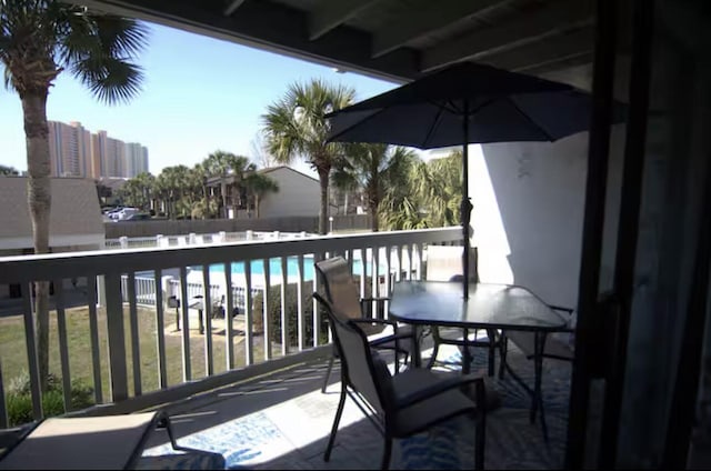 17614 Front Beach Rd Unit 12E, Panama City Beach, FL 32413 - balcony with outdoor dining area