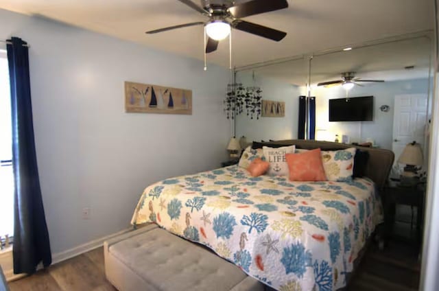 17614 Front Beach Rd Unit 12E, Panama City Beach, FL 32413 - bedroom featuring wood finished floors and ceiling fan