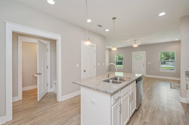 400 Mattie M Kelly Blvd Unit 7, Destin, FL 32541 - kitchen with light wood finished floors, white cabinetry, open floor plan, plenty of natural light, and recessed lighting