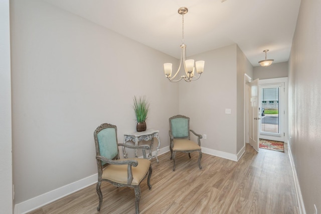 400 Mattie M Kelly Blvd Unit 7, Destin, FL 32541 - living area featuring light wood-style floors and a chandelier