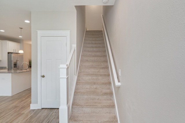400 Mattie M Kelly Blvd Unit 7, Destin, FL 32541 - stairway featuring wood finished floors and recessed lighting