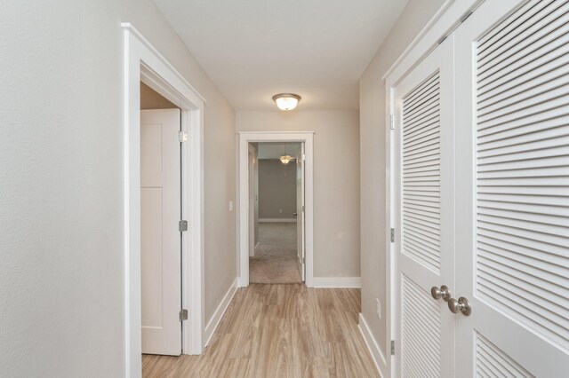 400 Mattie M Kelly Blvd Unit 7, Destin, FL 32541 - hallway featuring light wood finished floors and baseboards